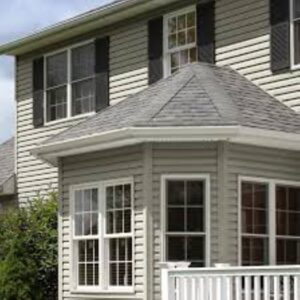 A house with two windows and a roof.