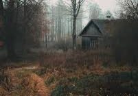 A long shot of the old house in the mountains